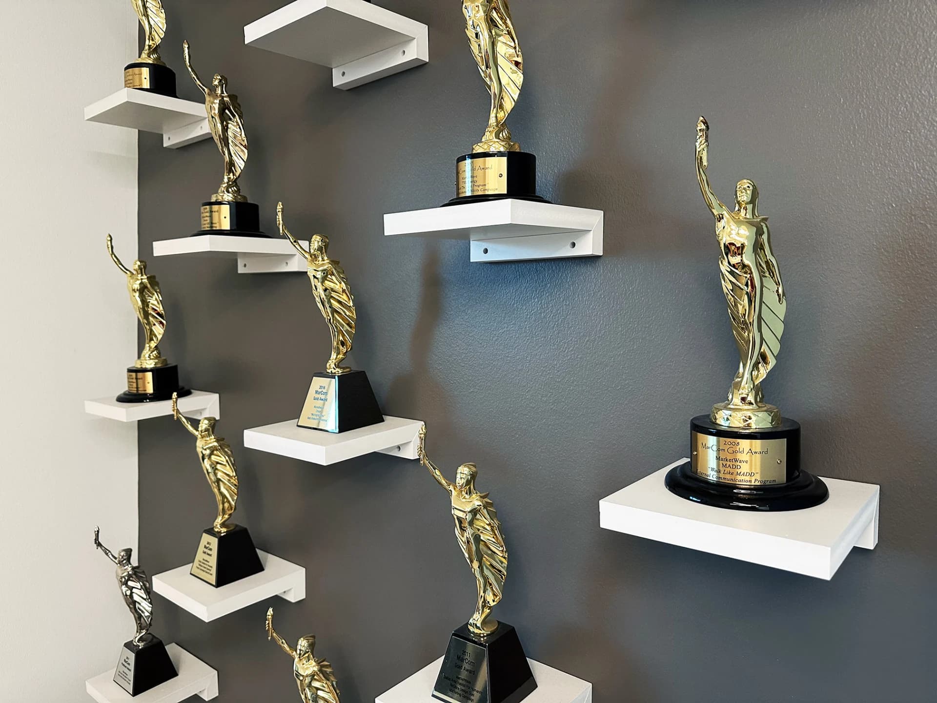 A shelf of awards