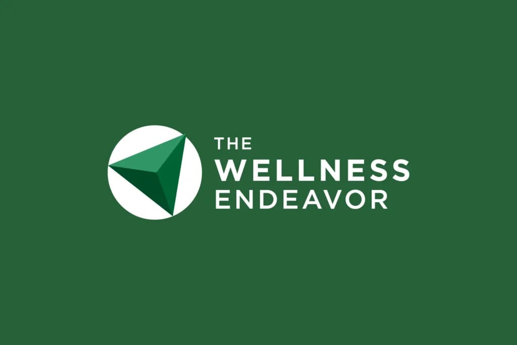 the logo for the wellness endeavor