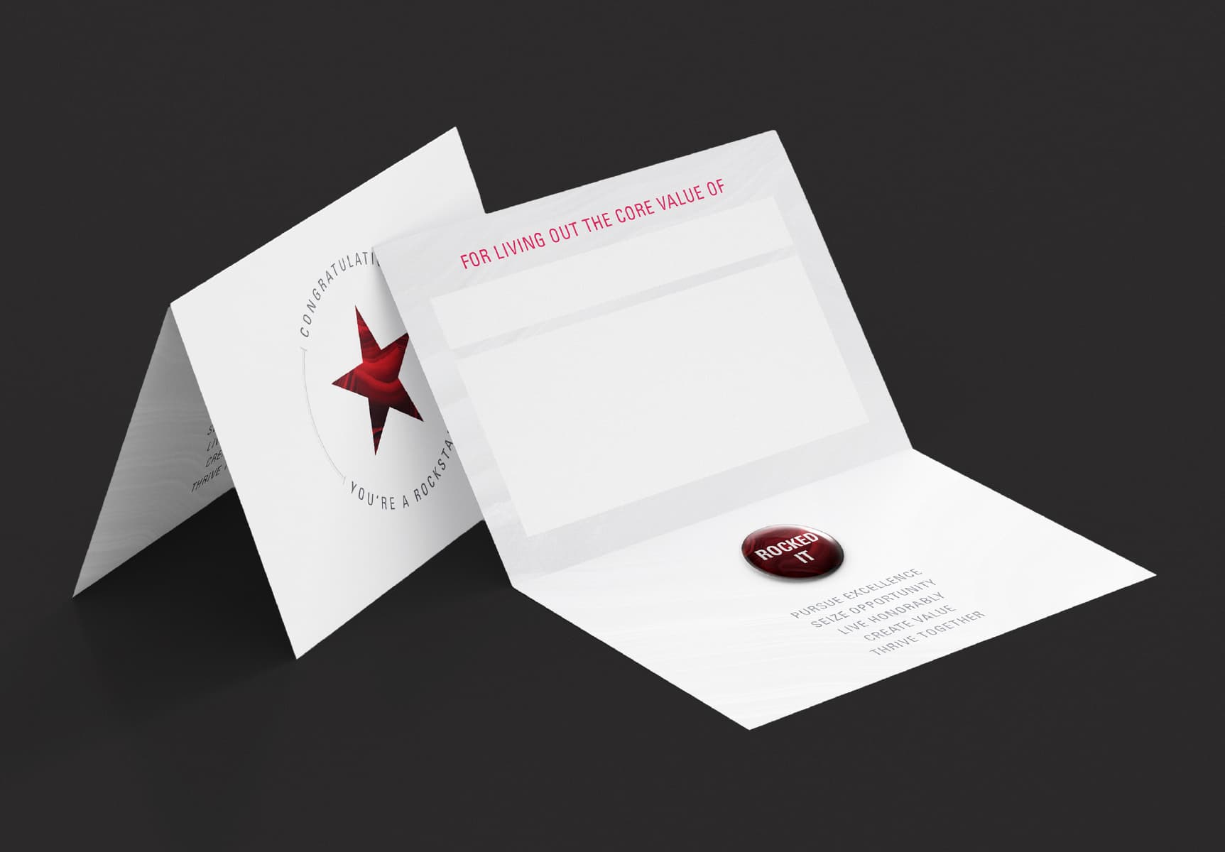A folded card with a red star on it, perfect for any occasion