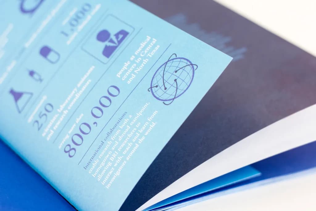 A close up of a book with a blue cover