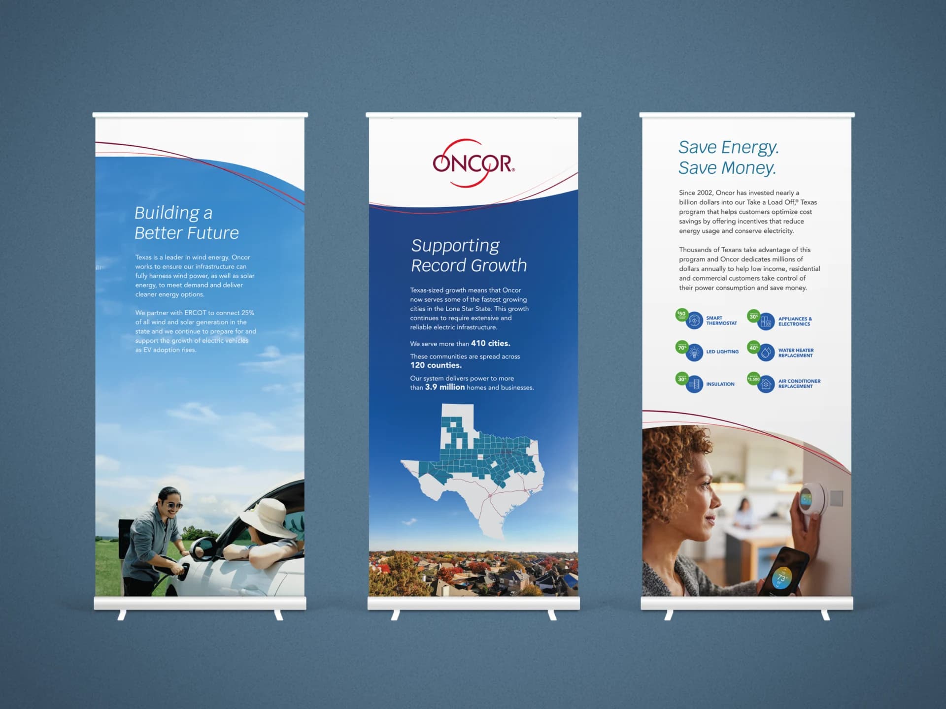 A set of three roll up banners on a blue background