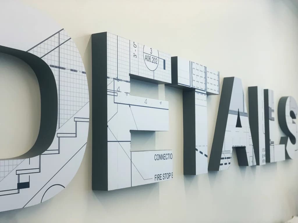 a sign on the side of a wall