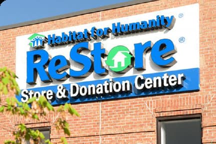 A sign for a store and donation center